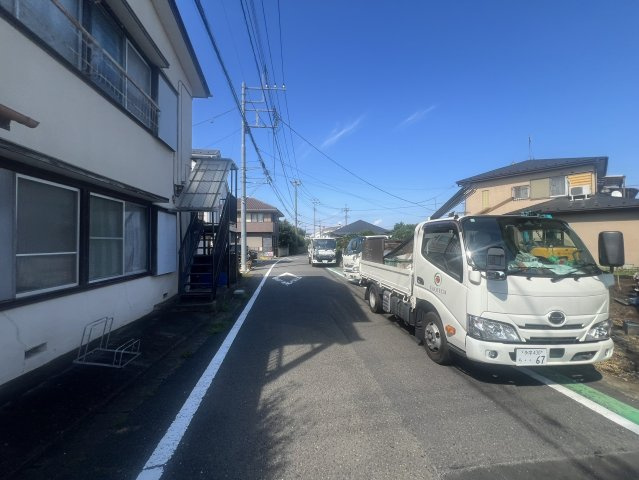 ハートフルタウン　多摩市百草1112番の前面道路含む現地写真