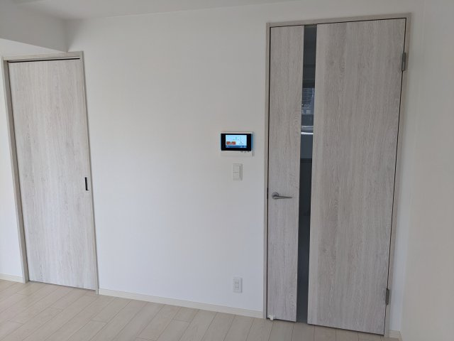 グルーブ神戸元町アリアの居間・リビング|モデル住戸901の室内写真です