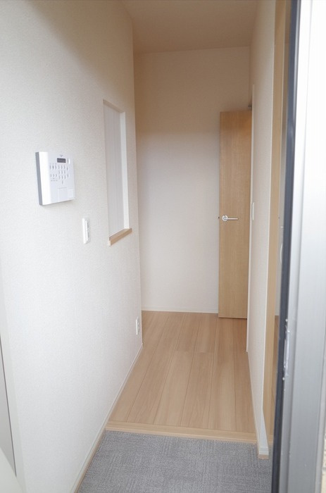 セジュール上地の玄関