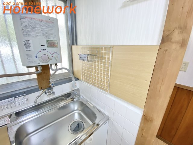 唐池ハイツのキッチン|コンパクトなキッチンで掃除もラクラク
