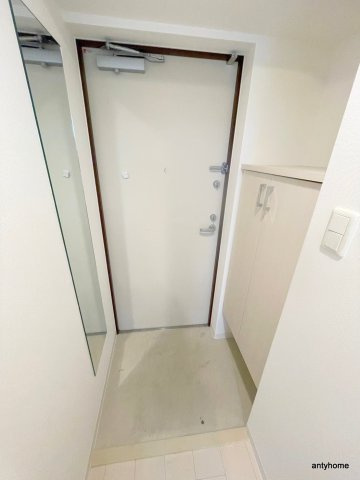 セレニテ本町グランデ　仲介手数料無料の玄関