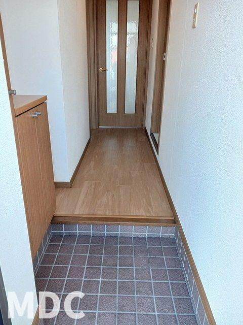 クィーンパレスＴＡＤＡ．Ｃ棟の玄関