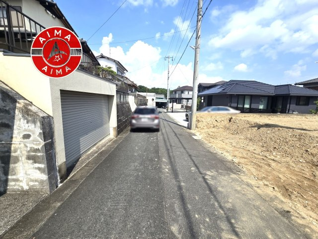 大野城市平野台4丁目第7-1棟（1号棟）の外観|前面道路含む現地の写真です。