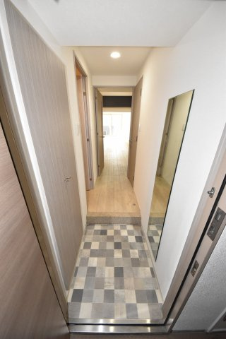 エムヒルズ南堀江サウスの玄関