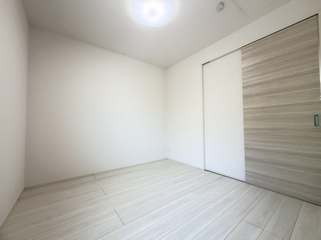 グランクレール西二見の洋室
