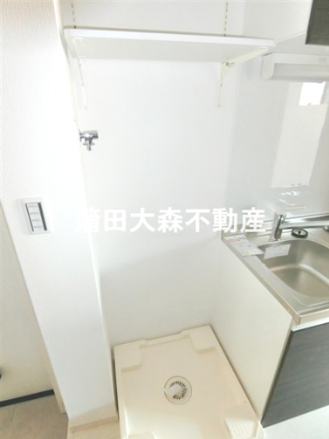 グランクオール京急蒲田の設備|棚付きの洗濯機置き場