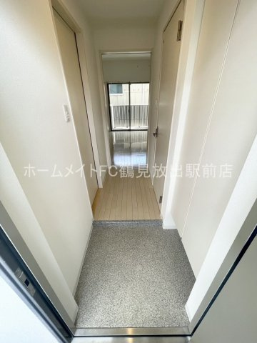 大阪市城東区東中浜４丁目の賃貸マンションの玄関