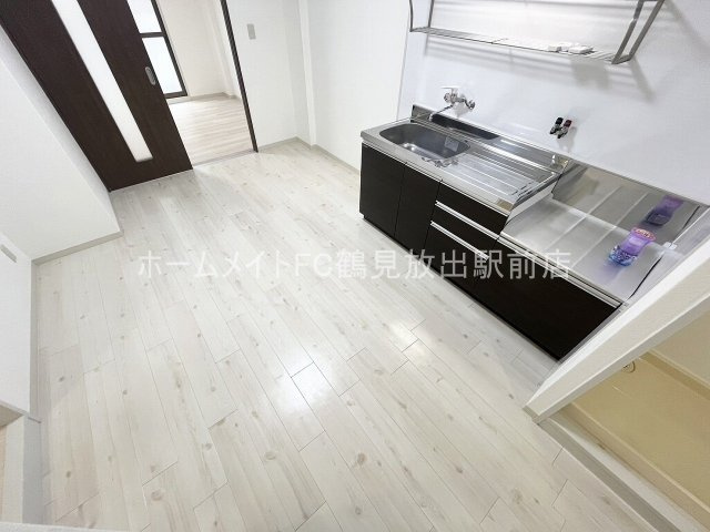 大阪市鶴見区鶴見４丁目の賃貸マンションの居間・リビング