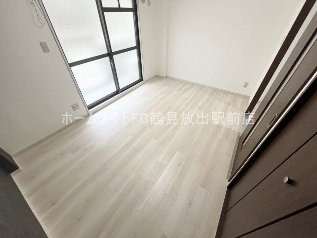大阪市鶴見区鶴見４丁目の賃貸マンションの洋室