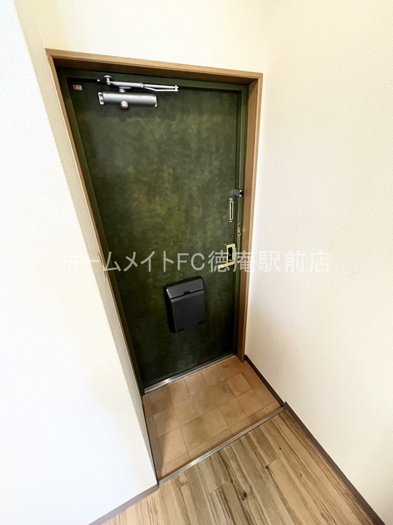 オズレジデンス鶴見の玄関