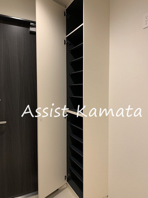 プレジールウエストの玄関