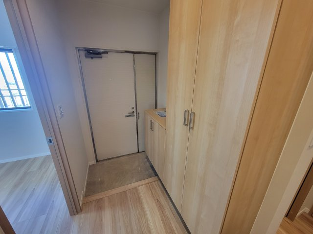 マンション長田11の玄関