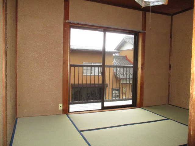 西改田松の木戸建の寝室
