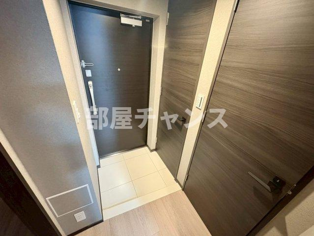 プレサンスレイズ金山アクスの玄関
