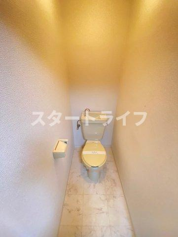 大阪市淀川区木川西２丁目の賃貸マンションのトイレ
