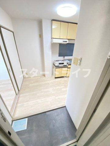 大阪市淀川区木川西２丁目の賃貸マンションの玄関