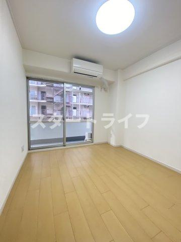 大阪市淀川区西宮原２丁目の賃貸マンションの寝室