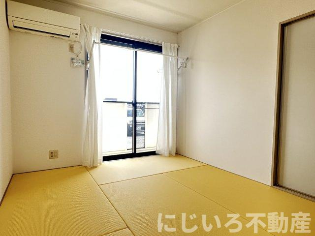 エスパシオ那賀川Bの居間・リビング