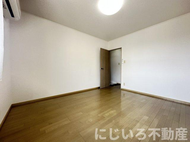 エスパシオ那賀川Bの居間・リビング