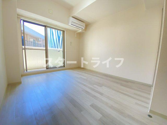 大阪市淀川区東三国３丁目の賃貸マンションの居間・リビング