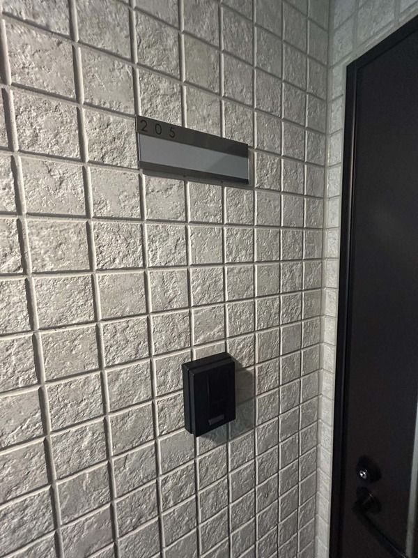 楽信マンションのエントランス