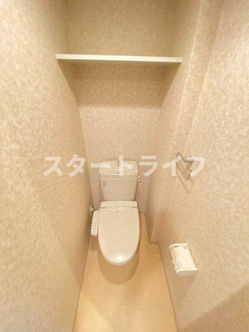 大阪市淀川区木川西２丁目の賃貸マンションのトイレ