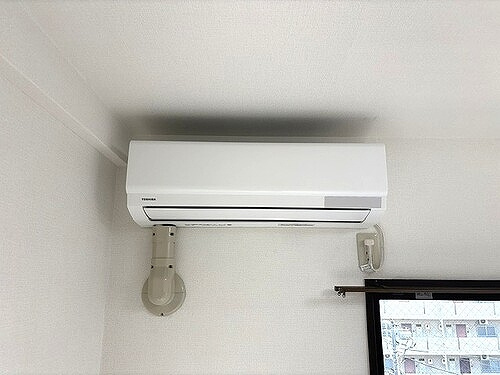 ライオンズマンション岡山医大南の設備|洋室に設置のエアコン　※2026年4月撮影