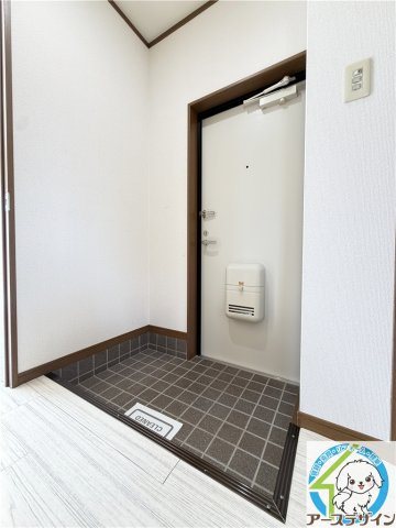 明南ハイツフジイの玄関