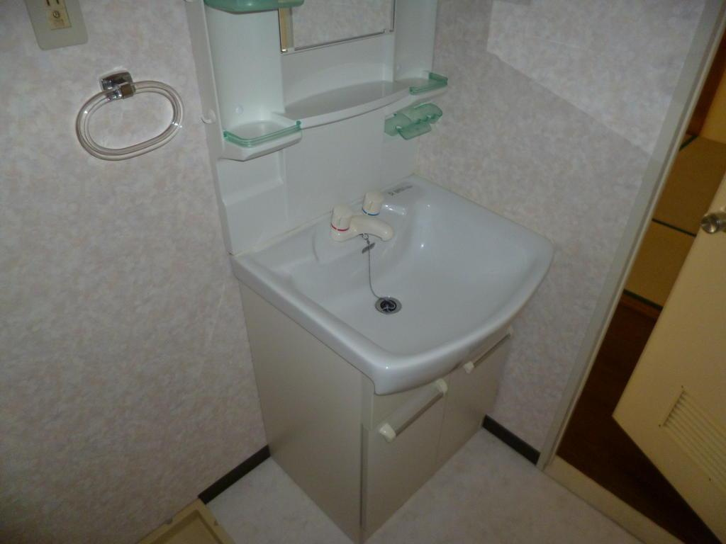 明石市小久保３丁目の賃貸マンションの洗面所