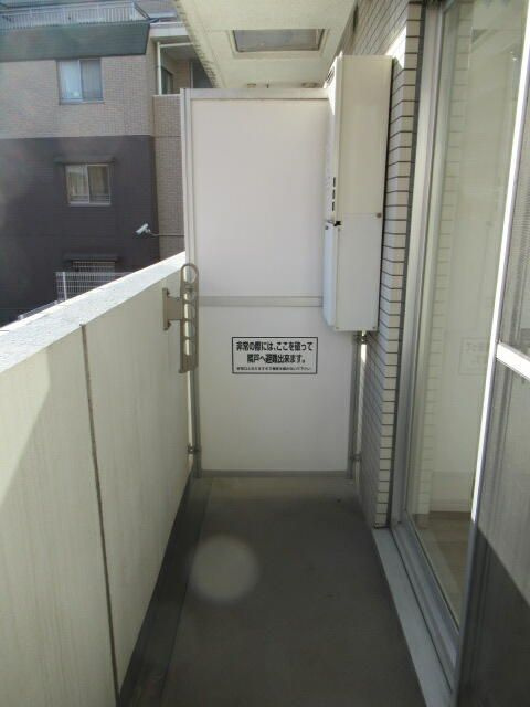 Ｒｉｓｉｎｇ　ｐｌａｃｅ　西新井のバルコニー