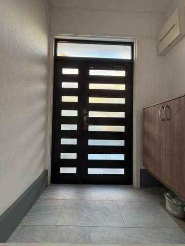 平田2丁目貸家の玄関