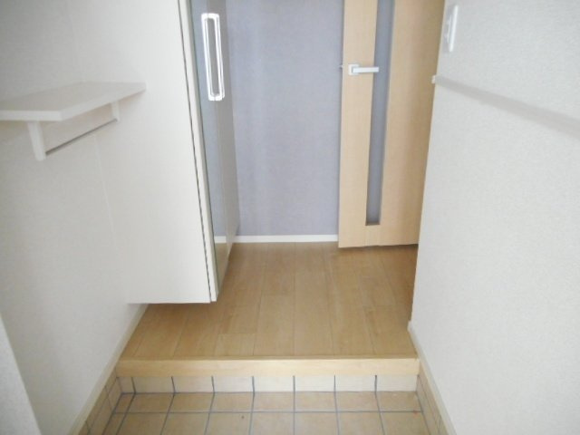 オーキッド　プレイスの玄関