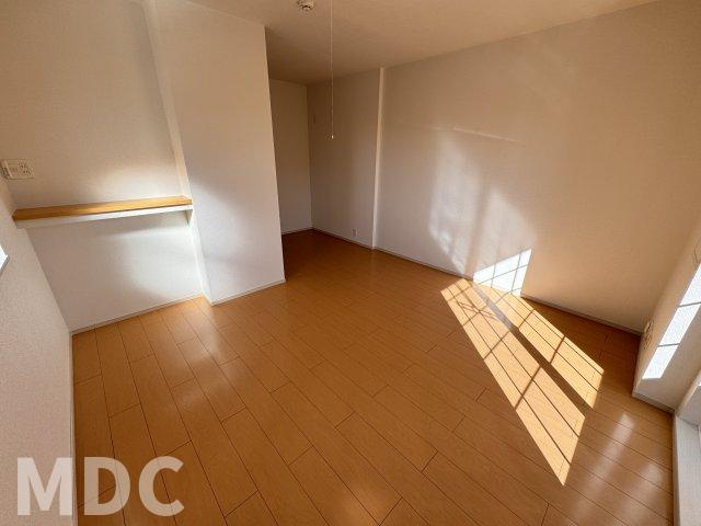 板野郡北島町北村字壱町四反地のアパートの居間・リビング