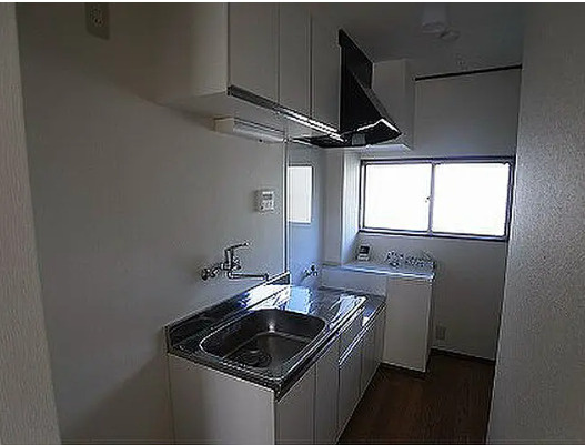 富士マンションのキッチン|写真は別のお部屋のものになります。