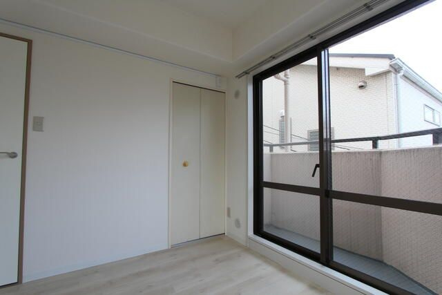 リッシェル生田の寝室