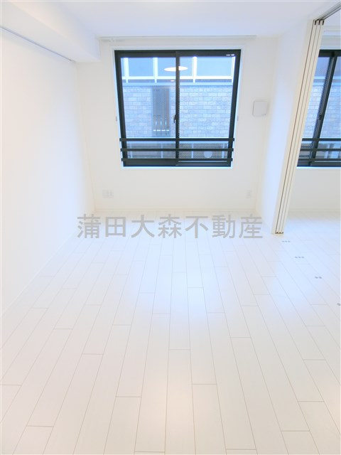 COCOCUBE大森西　東邦医大通りの居間・リビング