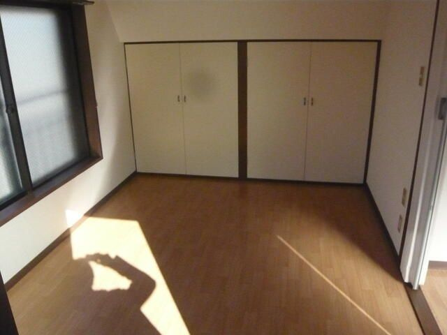 田口第一マンションの寝室