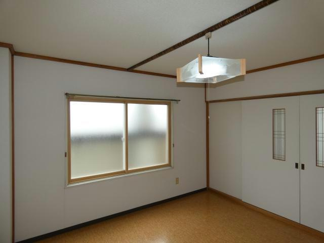 コーポ江花の洋室