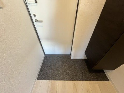 ジーメゾン春日部上蛭田カヴェリの玄関