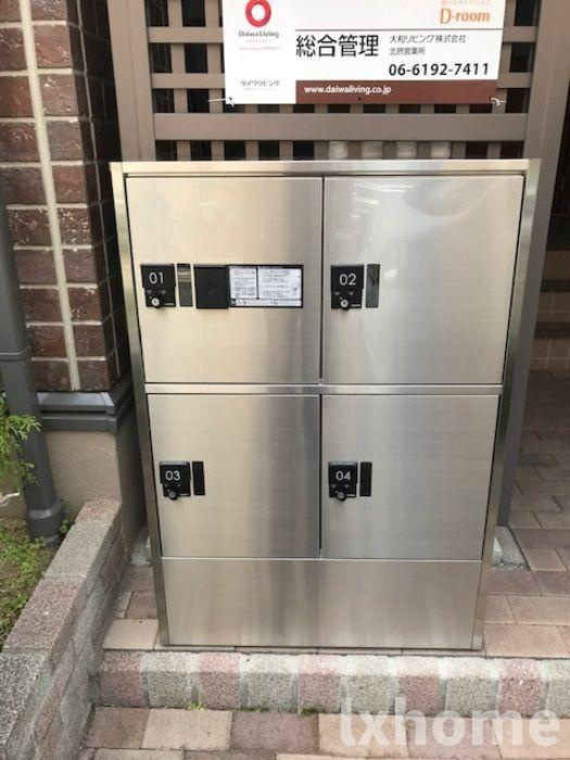 アウラ千里丘のエントランス|建物の内部です
