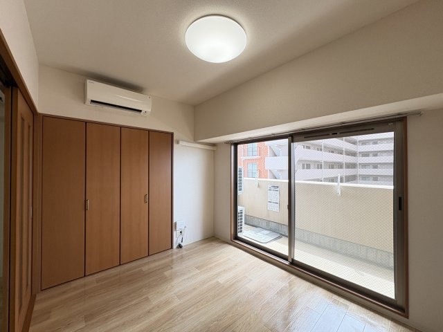マンションニューヨーク医大東の寝室