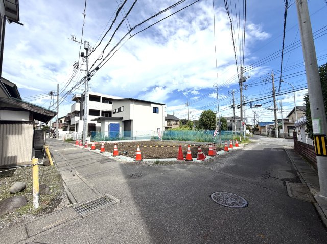 越谷市越ヶ谷本町１期１号棟FIT-A　新築戸建の外観|建築前の開放的な更地スペース。お部屋からの景色や隣家との距離感をイメージしやすい現場状態です。