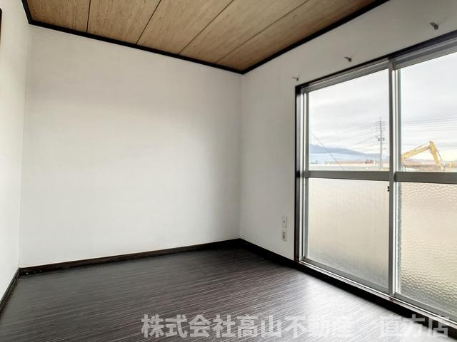 直方市新町３丁目のアパートの寝室