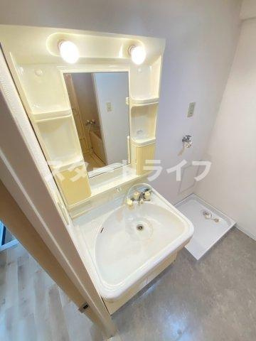 大阪市東淀川区菅原３丁目の賃貸マンションの洗面所