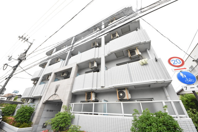 アルファ西古松の外観