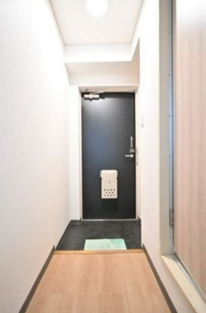 ホーユウコンフォルト神奈川新町の玄関