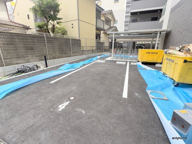 エスリードレジデンス　ザ・グラン新大阪フラッツ　仲介手数料無料の駐車場