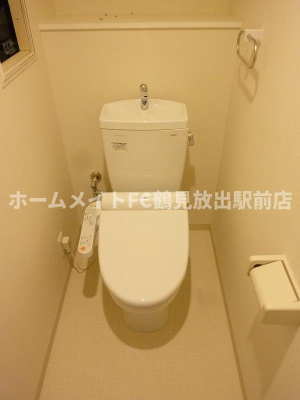 大阪市城東区東中浜８丁目の賃貸マンションのトイレ