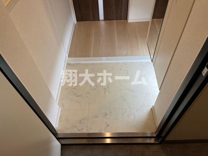クリアル落合南長崎の玄関