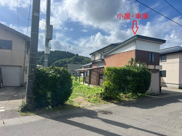 岩谷町売地の外観|256-1宅地　小屋・車庫　NTT柱